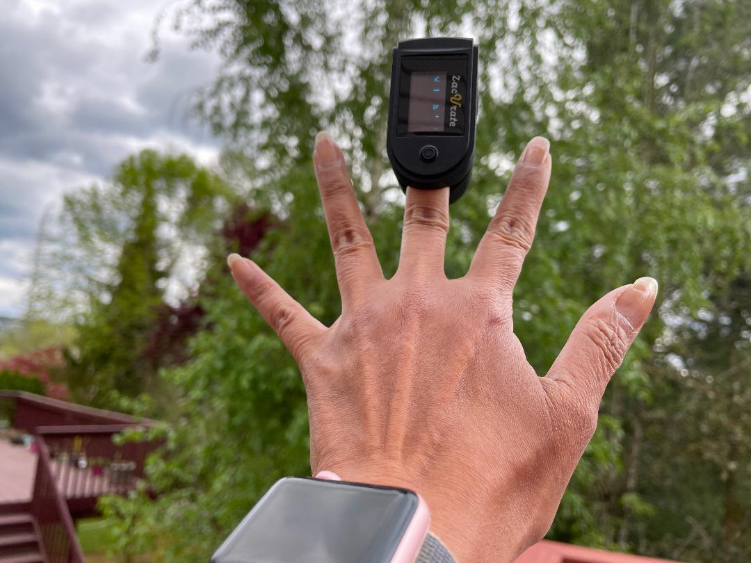 My hand image with a zacurate pulse oximeter